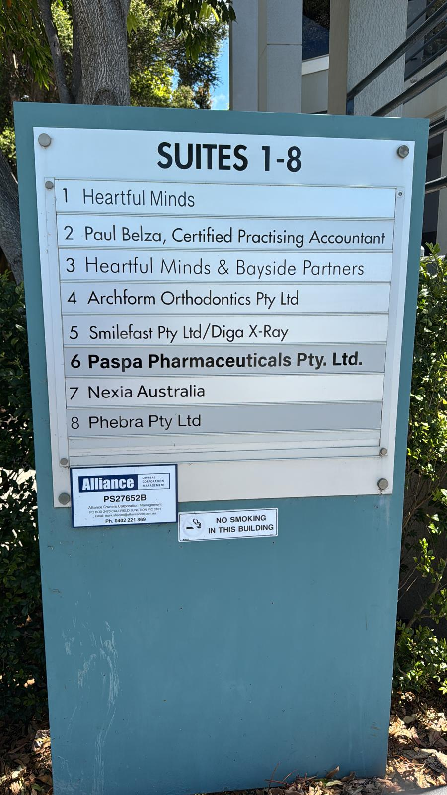 Supplied photograph of building directory showing Paspa Pharmaceuticals Pty. Ltd.